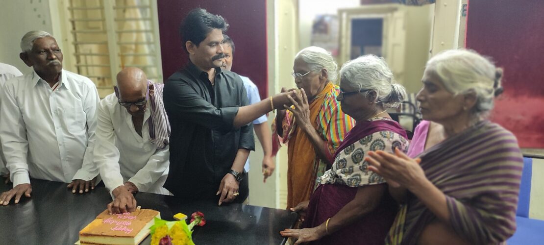 Sharing love with cake to ELderly person